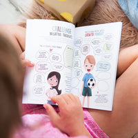 Person reading a book with educational content on personal growth and mindset.