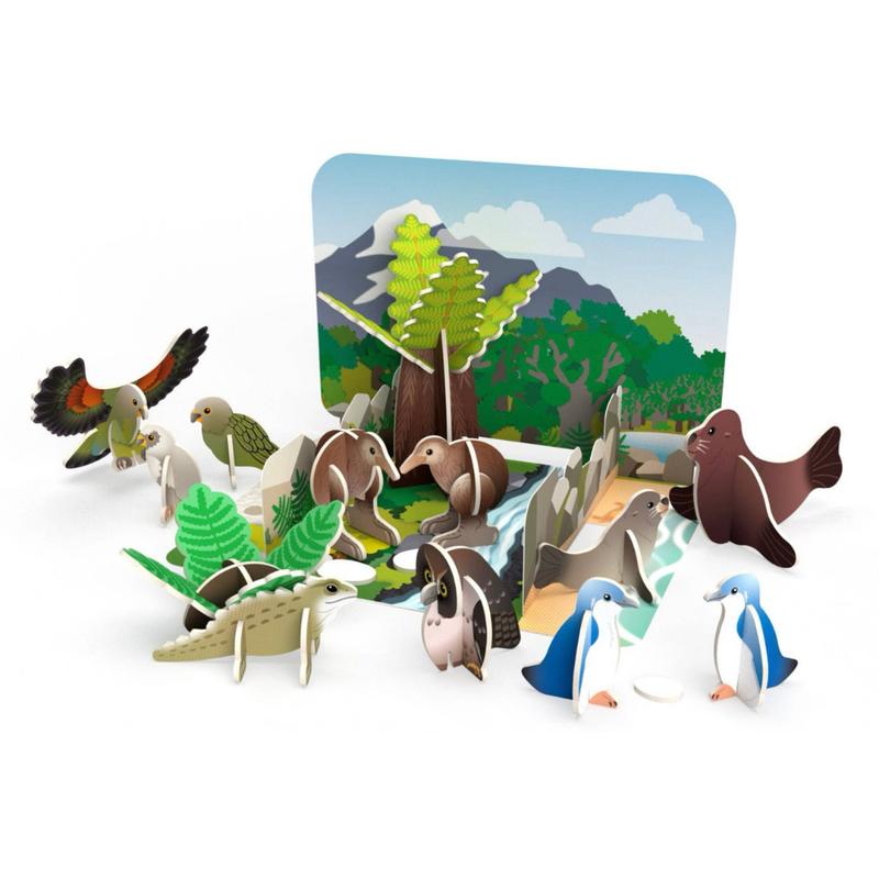 Set of animal figurines with a forest background
