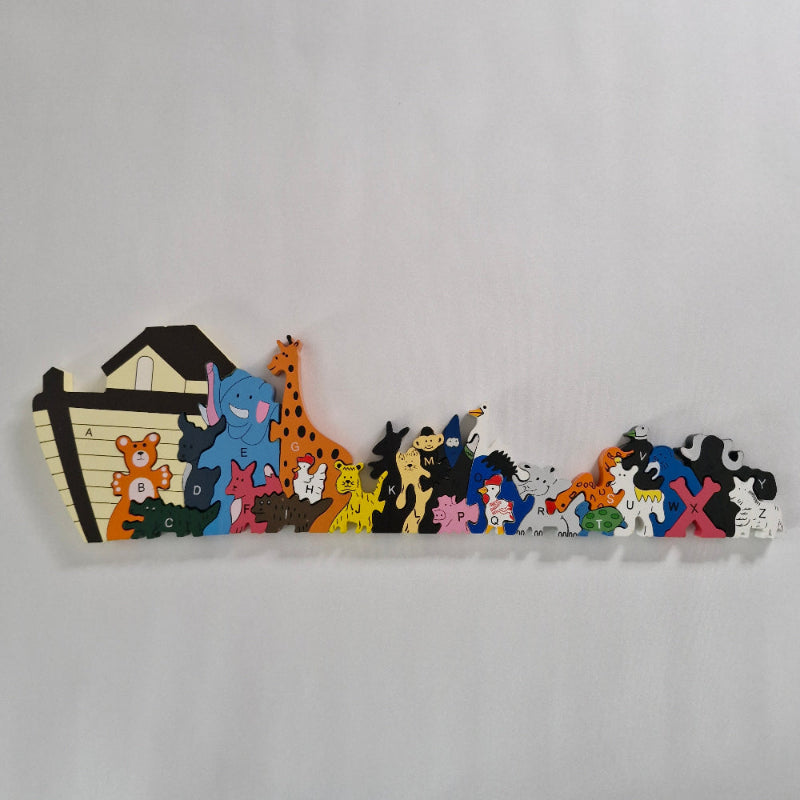 Colourful animal-shaped puzzle on a gray background
