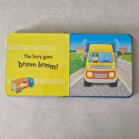 Children's book with a colourful illustration of a lorry on a textured surface