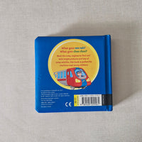 Blue book cover with a colorful illustration of a train on a beige background