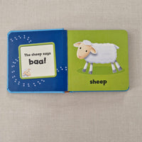 Children's book with a sheep illustration and text on a beige background
