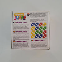 Colourful puzzle box with text and patterns on a plain background