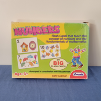 A box of 'Numbers Big Flash Cards' designed for teaching mathematics to young children, featuring various colourful illustrations of numbers and related activities.