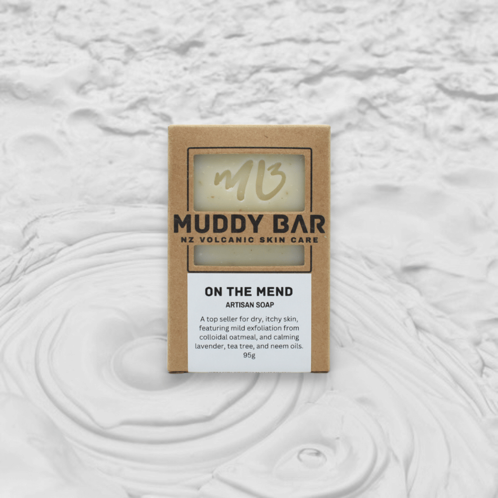 Muddy Bar NZ volcanic skin care soap packaging on a textured white background