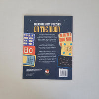 Back cover of a book titled 'Treasure Hunt Puzzles on the Moon' with colourful illustrations and text.
