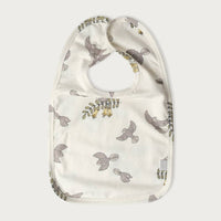 Baby bib with Piwakawaka Fantail bird pattern on a white background