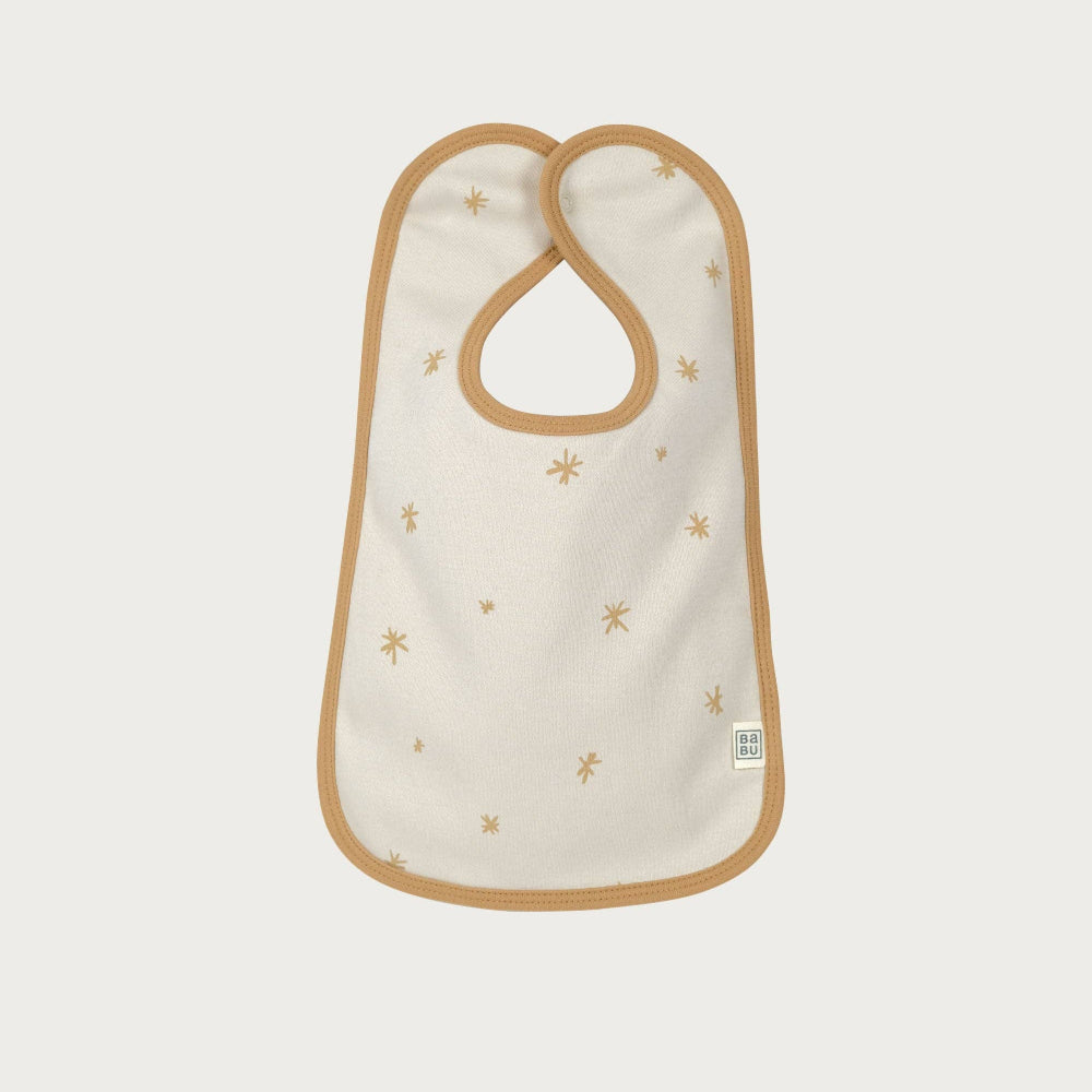 Baby bib with gold star pattern on a white background