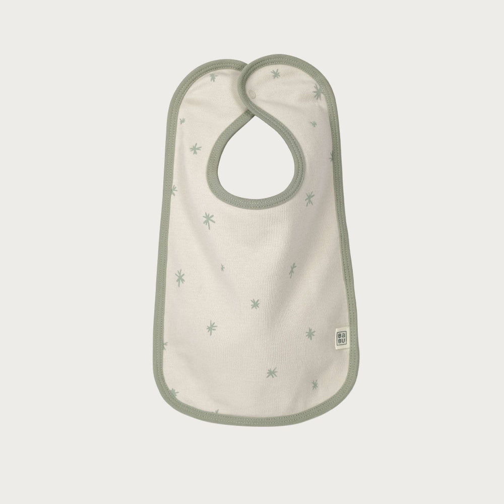 Baby bib with subtle pattern on a light gray background