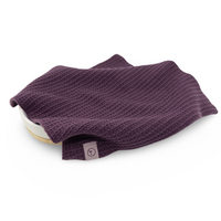 Grape purple knitted organic cotton  face cloth on a white background