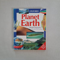 Book titled 'Planet Earth' by Oxford on a gray background