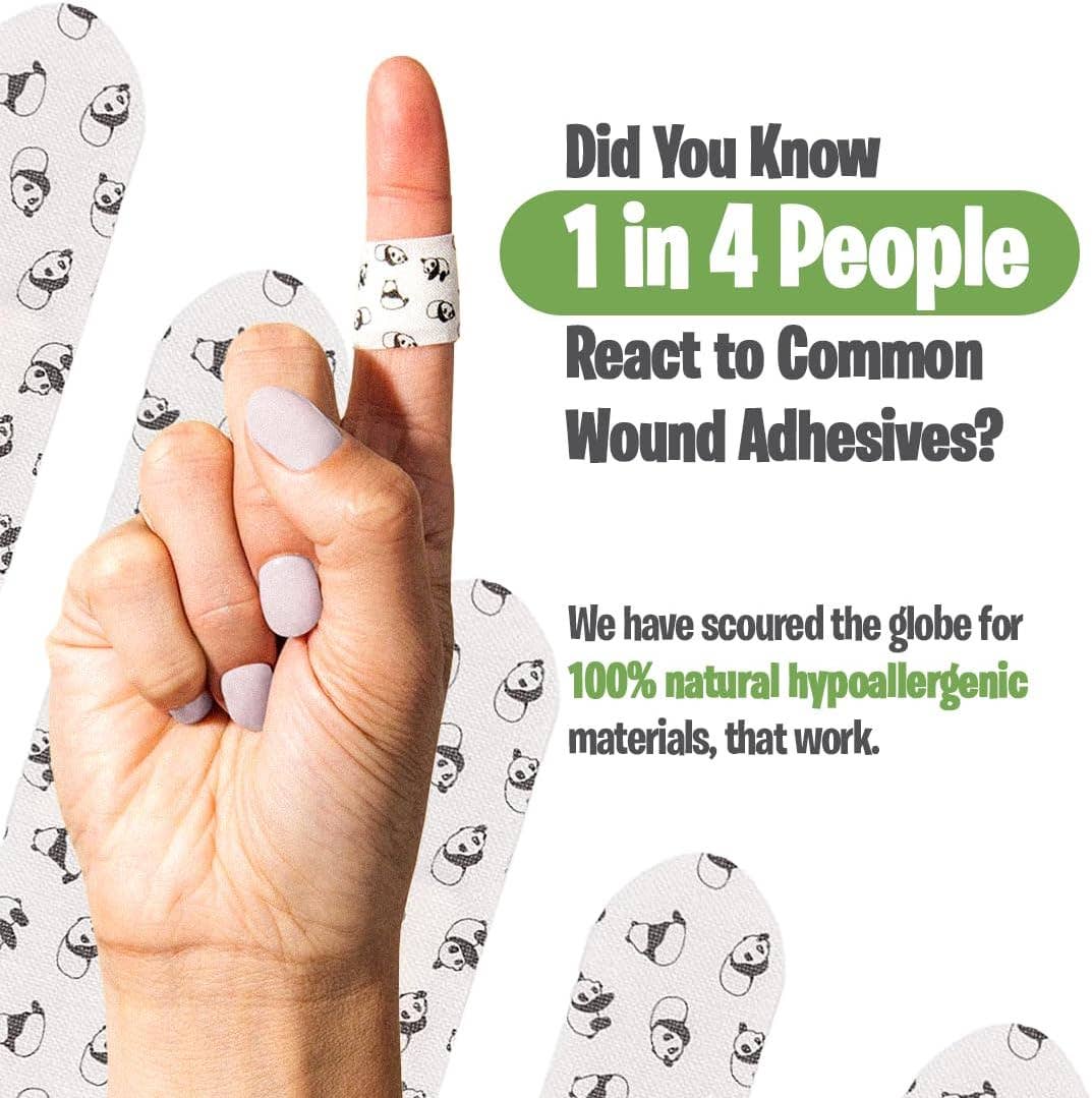 Hand wearing a bandage with panda design and text about wound adhesives and hypoallergenic materials.