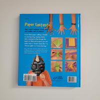 Back cover of Paper Fantastic book, showing a child with a mask, and hands with bracelets