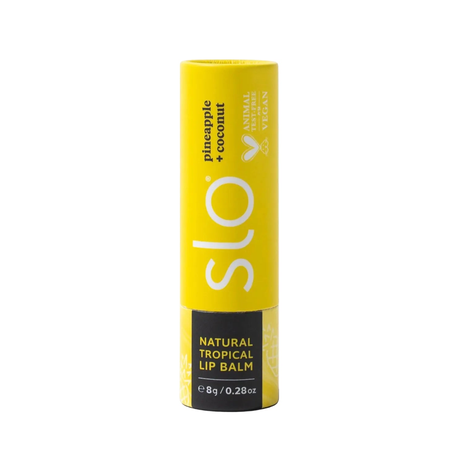A yellow tube of slo lip balm, Pineapple + Coconut flavour, standing upright on a white background with a soft shadow.