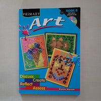 Book titled 'Primary Art' with colourful artwork on a blue cover against a gray background