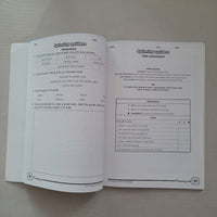 Open book with educational content on a plain background