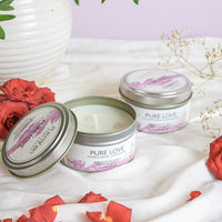 Pure Works 80g candle in a tin sitting on a white table cloth