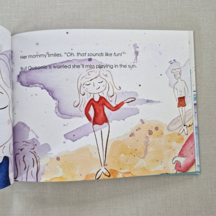 Illustrated book page with characters in a colourful beach scene on a textured surface