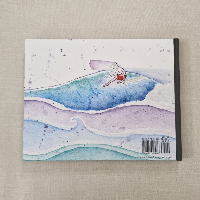Back of book with featuring a surfer on a wave