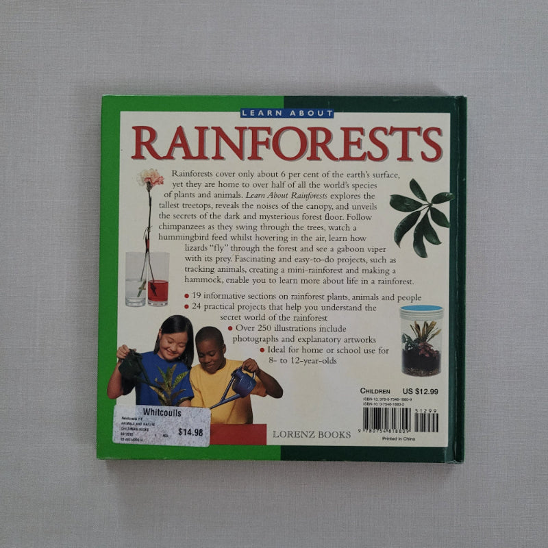 Book cover of 'Rainforests' on a gray background