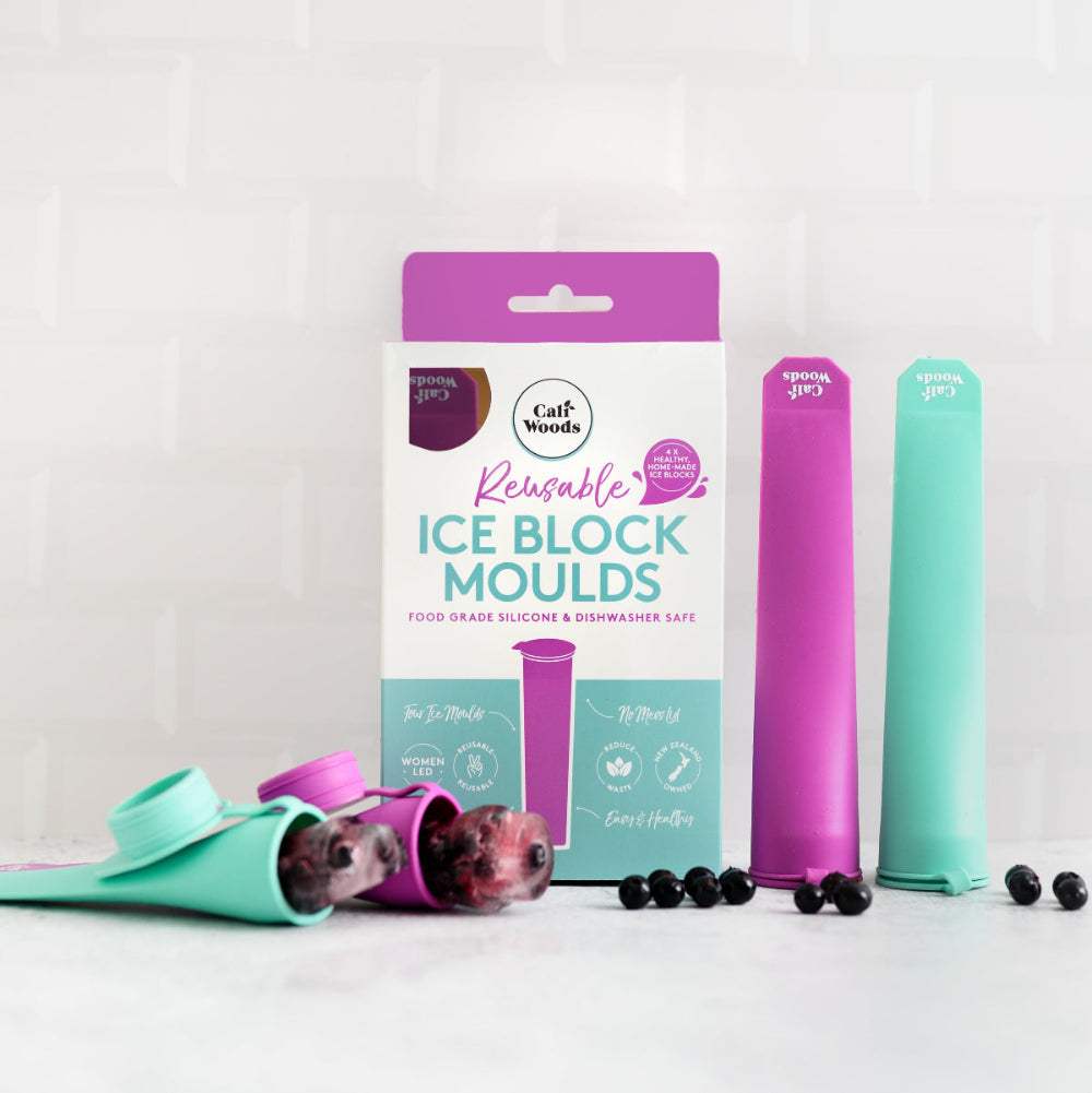 A set of ice block moulds in various colors with their packaging, designed for making homemade ice treats.