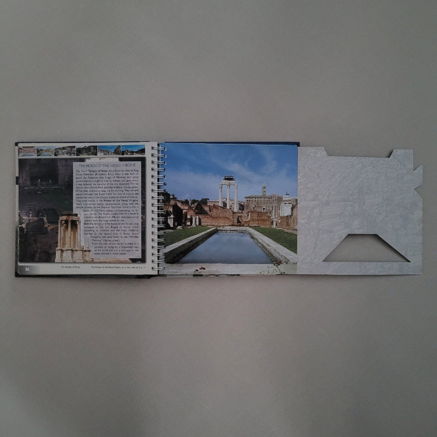 Book with images of a architectural site on a gray background
