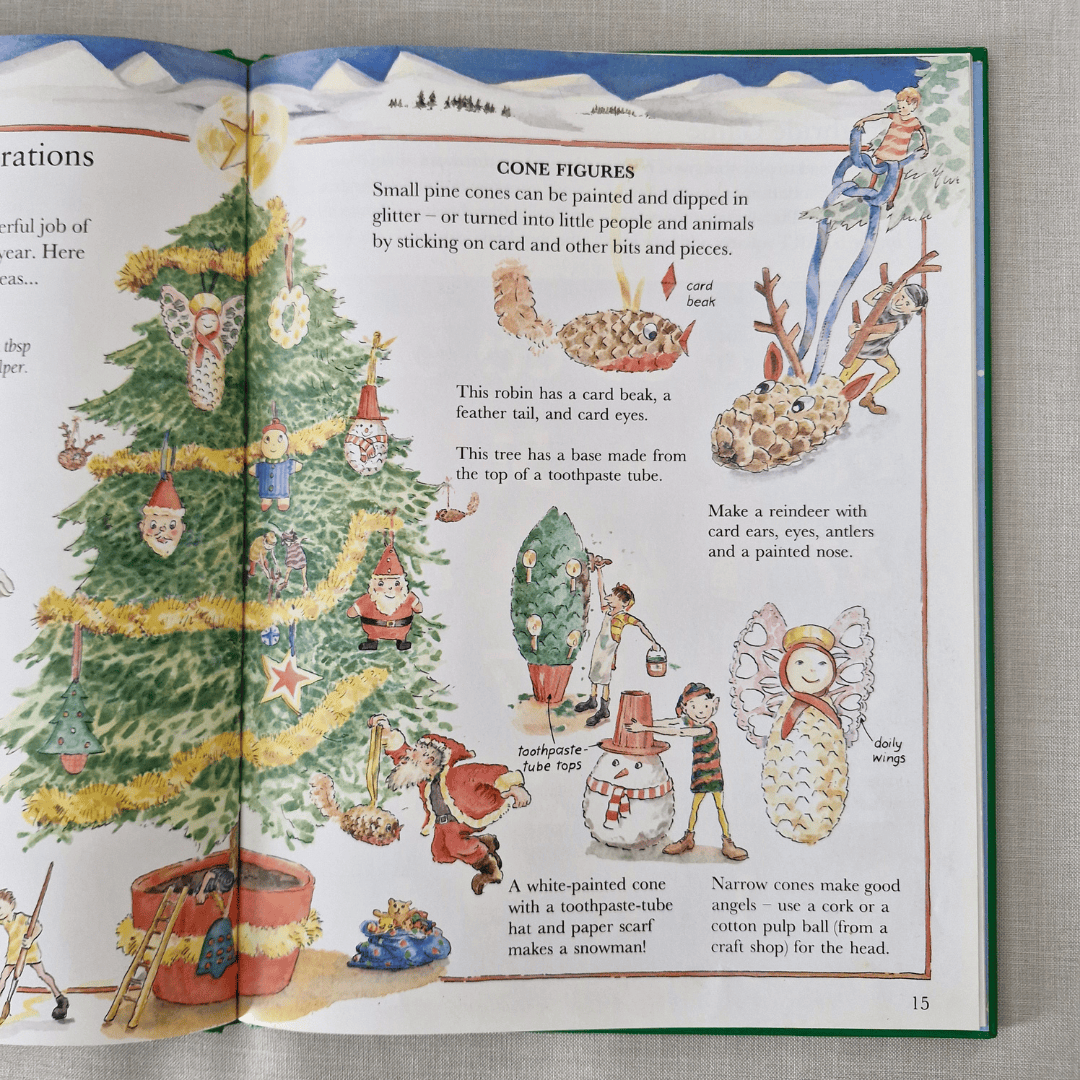 Open book with Christmas-themed illustrations and text on a textured surface