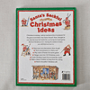 Book back titled 'Santa's Sackful of Best Christmas Ideas' on a textured grey background