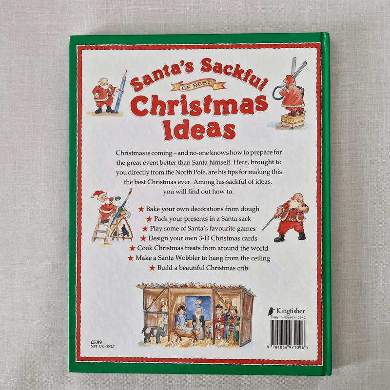 Book back titled 'Santa's Sackful of Best Christmas Ideas' on a textured grey background