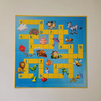 Children's board game with colourful illustrations on a blue and yellow grid