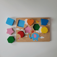 Wooden shape sorting puzzle with colorful shapes on a white background