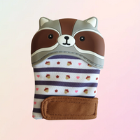 A silicone teething mitt designed to resemble a brown raccoon with a striped pattern and a velcro strap.