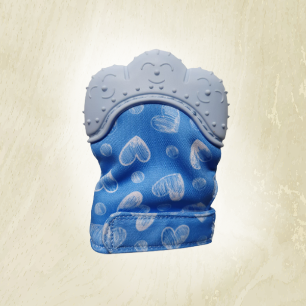 A blue teething mitt with a heart pattern, designed to fit on a baby's hand.