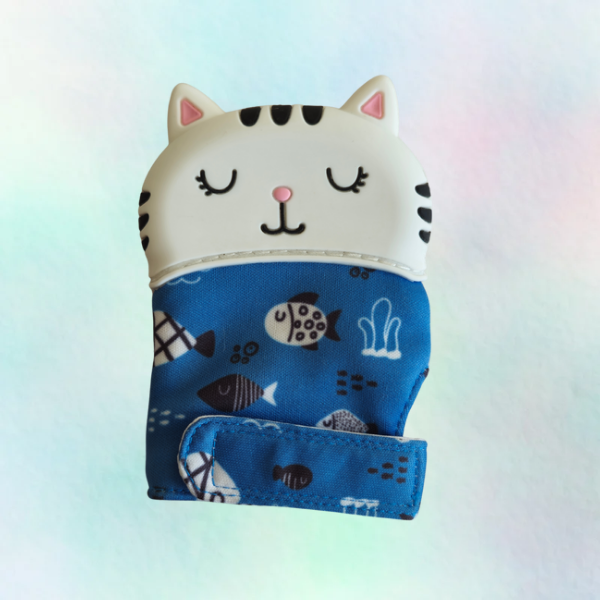 A silicone teething mitt designed to resemble a cat, with a blue patterned sleeve and a white silicone top.
