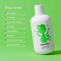 Noody bottle of gentle baby & body wash on a green background with product features listed.