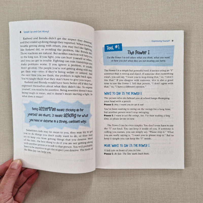 Open book with educational content on a textured surface