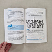 Open book with text and illustrations on a textured surface