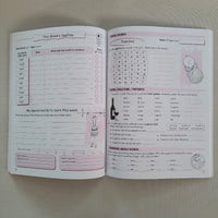 Open book with educational content on a plain background