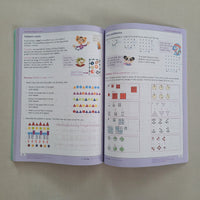 Open book with patterned maths exercises on a plain background