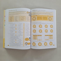 Open book with educational content on a plain background