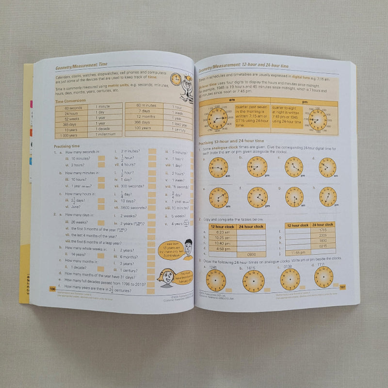 Open book with educational content on a plain background