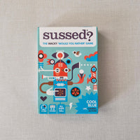 Board game box titled 'Sussed?' on a textured surface