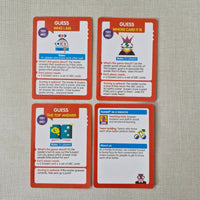 Four educational cards with colourful graphics and text on a textured grey surface