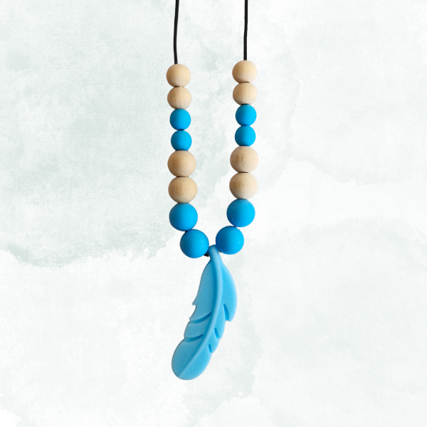 Necklace with blue and beige beads and a blue feather pendant on a white background