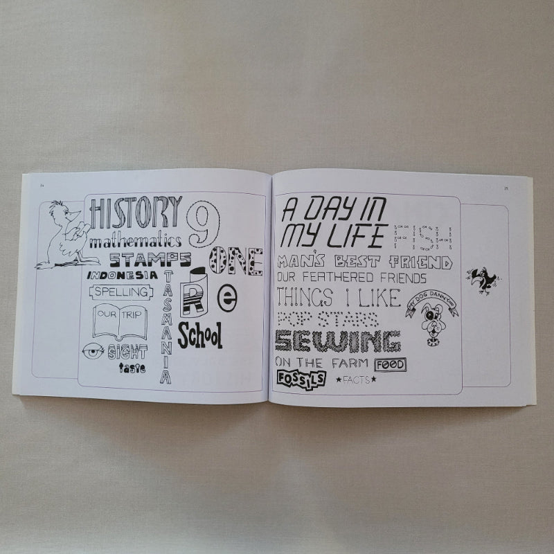 Two open pages with black lettering illustrations on a beige background