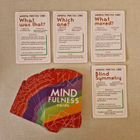 Set of mindfulness practice cards on a textured surface