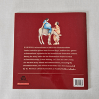 Book back cover with illustration of two figures on a donkey and text about Julie Vivas