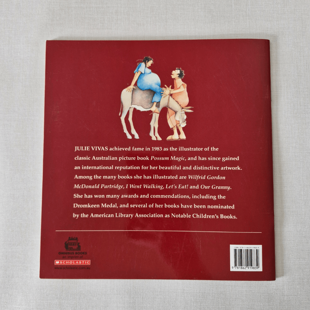 Book back cover with illustration of two figures on a donkey and text about Julie Vivas