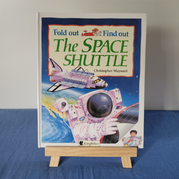 A children's book titled 'The Space Shuttle - Fold out and Find out' by Christopher Maynard, featuring illustrations of a space shuttle and an astronaut on the cover.
