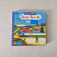Children's book titled 'Things That Go' on a textured surface